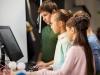 A photo of children at the computer
